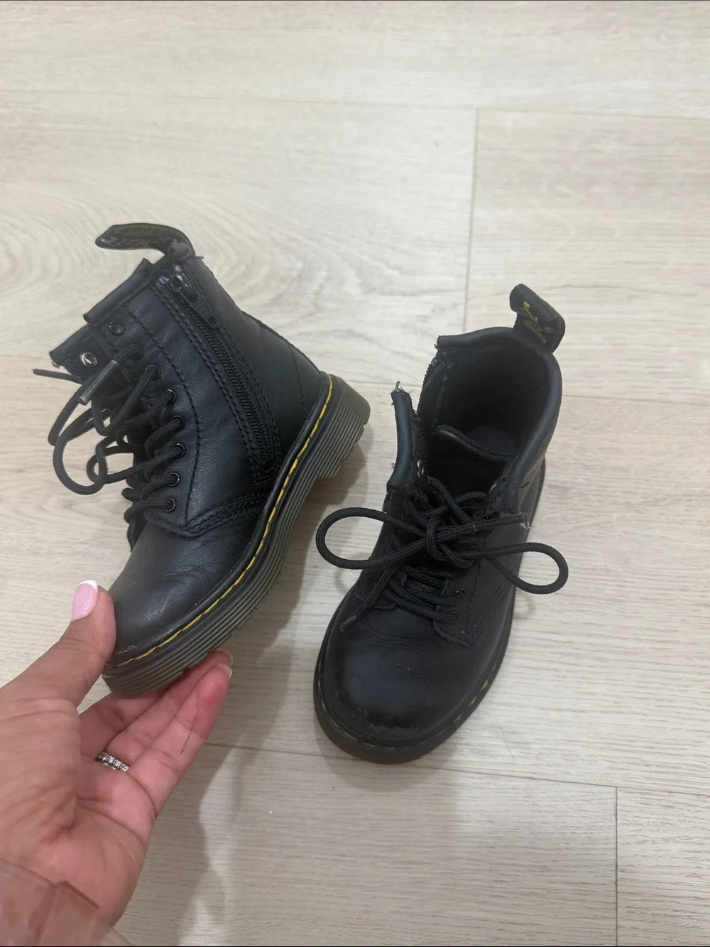 Dr. Martens Kids Black Leather Lace-Up Ankle Boots with Yellow Stitching